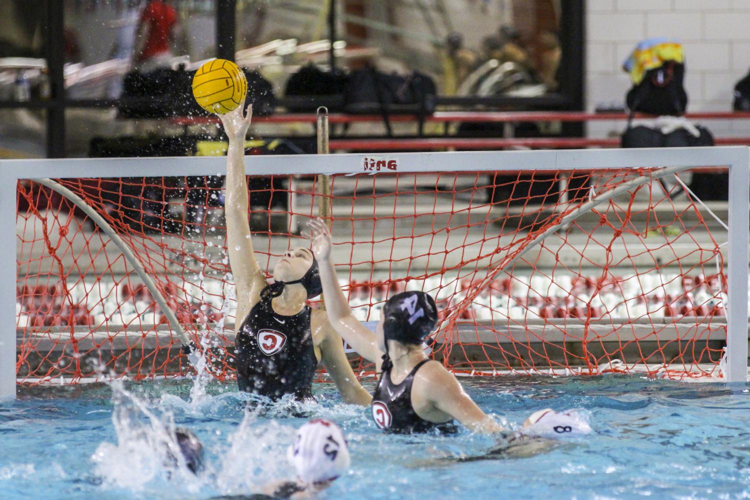 <a href='http://bgu.shuguangprinting.com'>BETVLCTOR伟德登录</a> student athletes compete in a water polo tournament on campus.